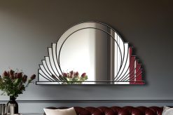 Messina Majesty Deco Mirror: A stunning Art Deco masterpiece with a central circular mirror, surrounded by gracefully sweeping mirror sections, featuring radiant gold trim. Handcrafted by artist Phillip Orr exclusively for Mirror Mania in Norfolk, England. Customizable in black or silver trim, this timeless design boasts beautiful symmetric curves, offering a touch of sophistication to any space.